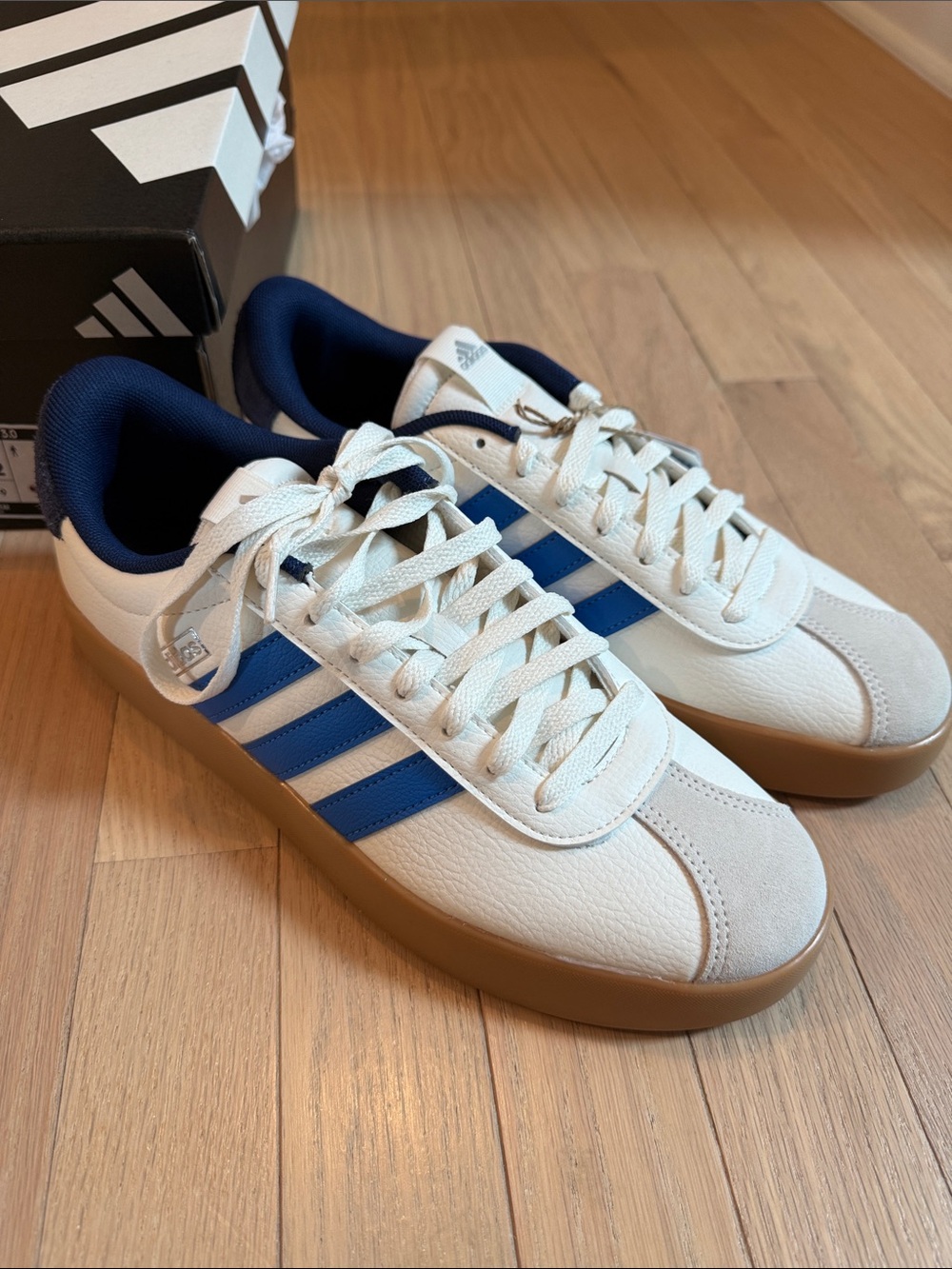 New with box adidas Men’s White Sneakers with Blue Stripes and Gum Sole
